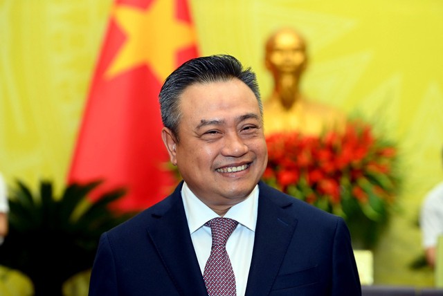 Ha Noi assigns tasks to Chairman and 6 Vice Chairmen - Ảnh 1.