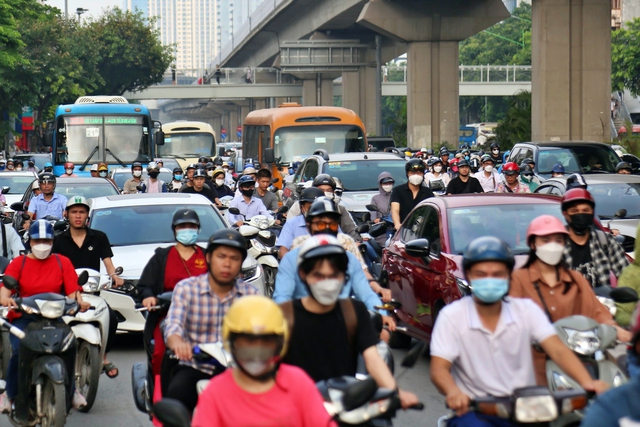 Motorbikes to be prohibited in 12 metropolitan districts by 2030 - Ảnh 1. Motorbikes to be prohibited in 12 metropolitan districts by 2030 - Ảnh 1.