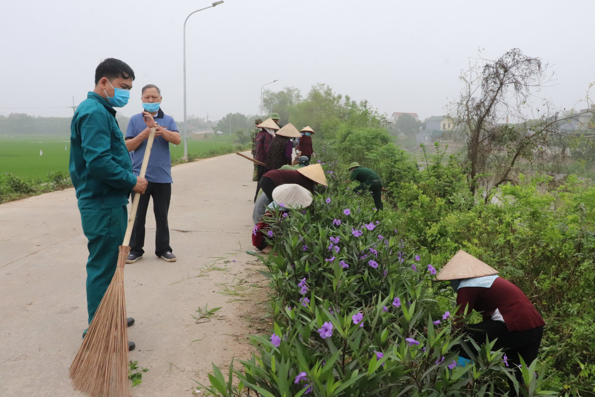 Nỗ lực đạt mục tiêu xây dựng nông thôn mới kiểu mẫu - Ảnh 1.