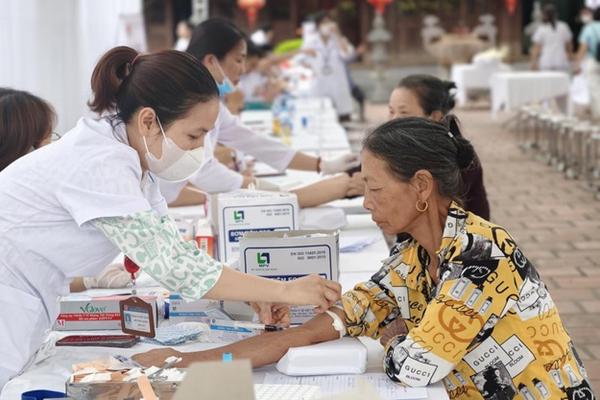 Hà Nội đặt mục tiêu 100% người yếu thế có hồ sơ an sinh xã hội số vào năm 2030 - Ảnh 1.