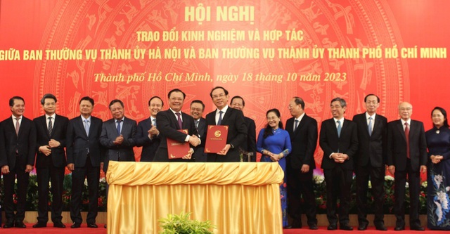 Ha Noi, HCMC sign MoU on decentralized relations - Ảnh 1. Ha Noi, HCMC sign MoU on decentralized relations - Ảnh 1.