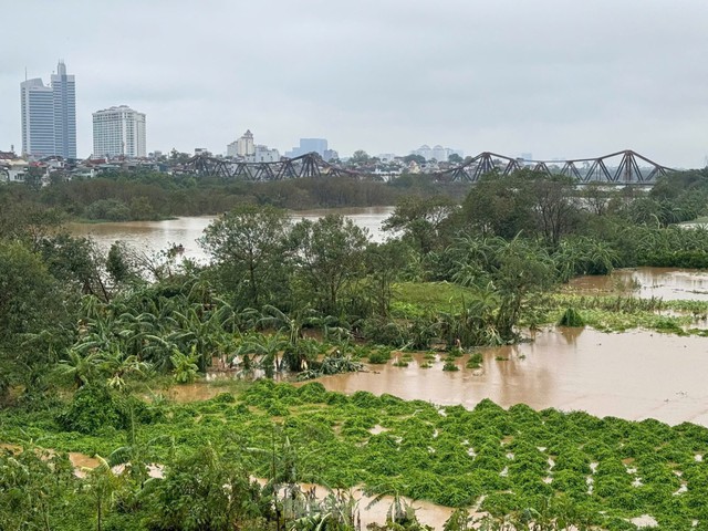 Ha Noi takes actions to respond to major flooding- Ảnh 1.