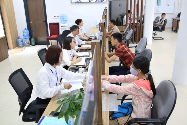 Ha Noi pilots AI 19001009 hotline for public service    - Ảnh 1.