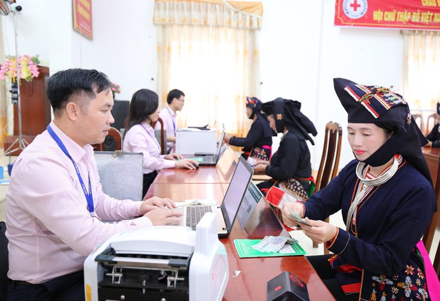 Hà Nội đẩy mạnh triển khai tín dụng chính sách xã hội - Ảnh 1.