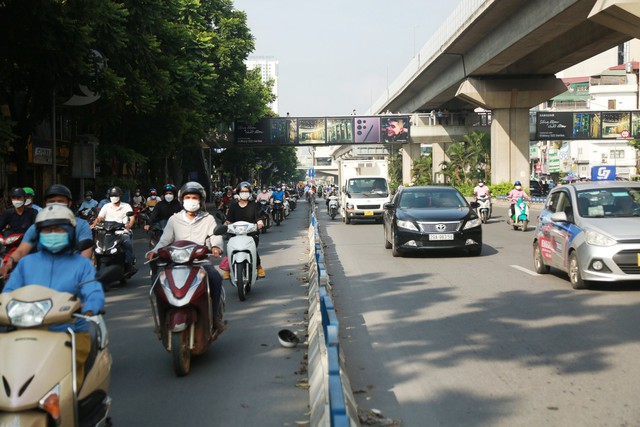 Giao thông vẫn ‘loạn’ trên những tuyến đường mới điều chỉnh - Ảnh 6.