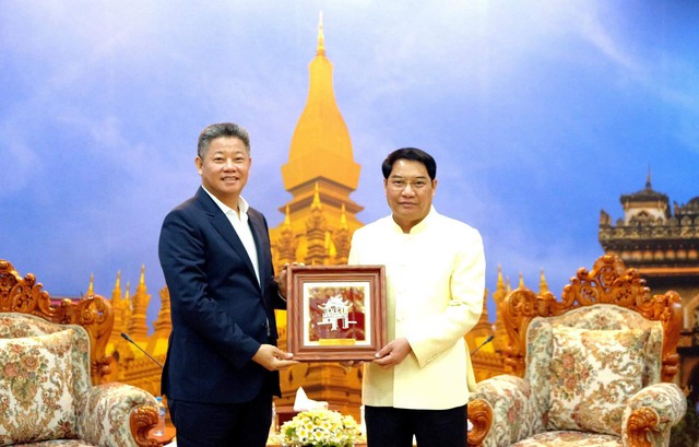 Mở rộng hợp tác đầu tư, thương mại giữa Hà Nội và Viêng Chăn- Ảnh 1.