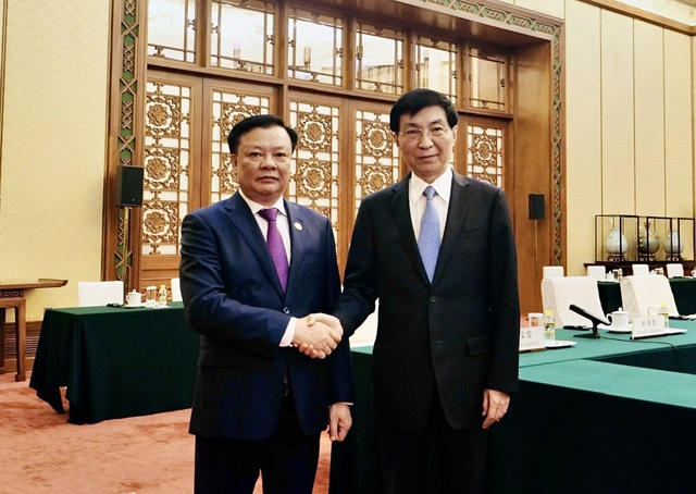 Đoàn đại biểu cấp cao Hà Nội chào xã giao Chủ tịch Chính hiệp Trung Quốc Vương Hộ Ninh - Ảnh 1.