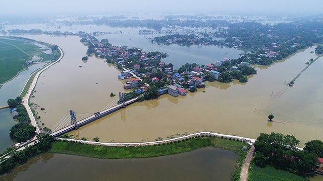 Rút báo động lũ trên sông Bùi, ngoại thành dồn tổng lực vệ sinh môi trường- Ảnh 1.