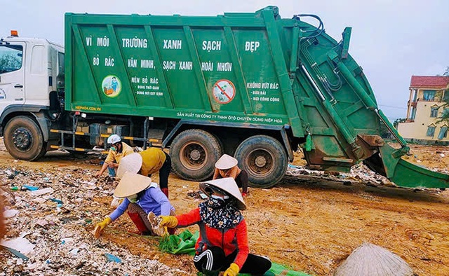 Hà Nội sẽ xây dựng 3 điểm thu gom tập kết rác tại huyện Mê Linh- Ảnh 1.