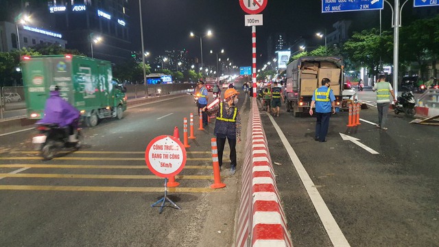 Hà Nội: Gỡ rào chắn, chính thức thông xe cầu vượt thép nút giao Mai Dịch - Ảnh 2.