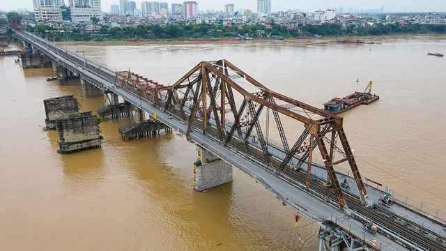 Cần có phương án tăng cường bảo vệ công trình cầu vượt sông- Ảnh 1.