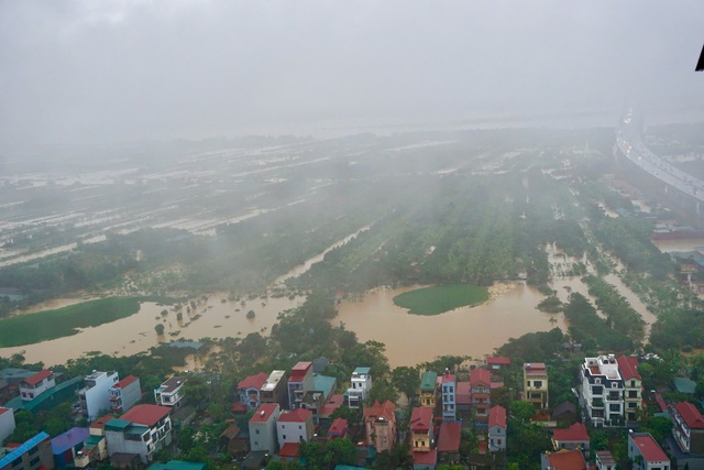 Hà Nội: Các quận, huyện ứng phó ngập lụt, bảo đảm an toàn cho người dân- Ảnh 6.