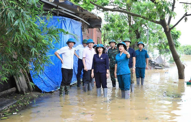 Kiên quyết di dời toàn bộ người dân ra khỏi khu vực mực nước sông dâng cao- Ảnh 1.