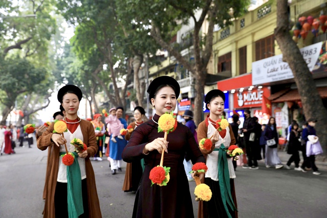 Tái hiện phong tục Tết xưa tại Thủ đô- Ảnh 12.