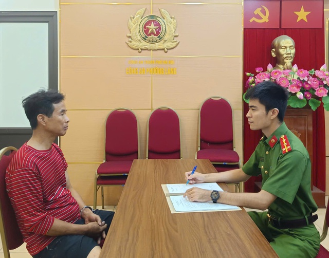 Tạm giữ hình sự đối tượng đốt rác trên tầng thượng gây cháy nhà tại Đê La Thành- Ảnh 1.