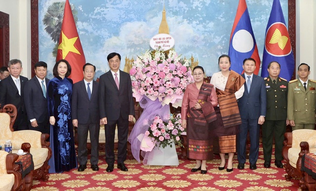 Lãnh đạo TP. Hà Nội chúc mừng 50 năm Quốc khánh nước Cộng hòa DCND Lào- Ảnh 1.