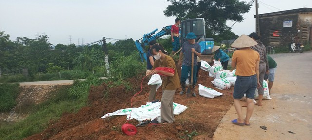 Bảo vệ an toàn đê điều, phòng chống thiên tai ngay từ đầu năm- Ảnh 1.