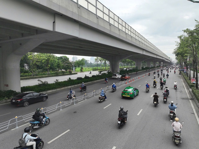 Hà Nội sẽ chính thức phân làn giao thông trên đường Phạm Văn Đồng từ 4/7- Ảnh 1.