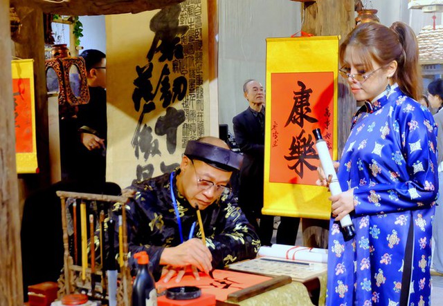 Gìn giữ và lan tỏa giá trị văn hóa Tết truyền thống tại Hà Nội- Ảnh 1.