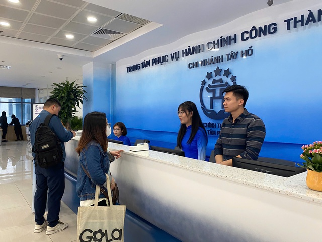 Hà Nội đẩy mạnh phân cấp, ủy quyền, nâng cao hiệu quả giải quyết thủ tục hành chính- Ảnh 1.