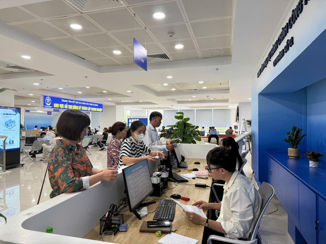 Hà Nội phấn đấu 95% hồ sơ thủ tục hành chính được xử lý trực tuyến toàn trình- Ảnh 1.