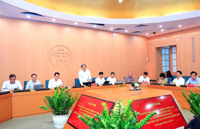 Hà Nội - Lào Cai trao đổi kinh nghiệm thực hiện Nghị quyết số 57- Ảnh 1.