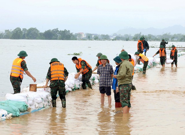 Các địa phương ứng phó lũ trên sông Bùi- Ảnh 1.