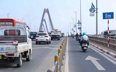 Hà Nội thí điểm giảm tốc độ làn ô tô sát dải phân cách trên cầu Nhật Tân